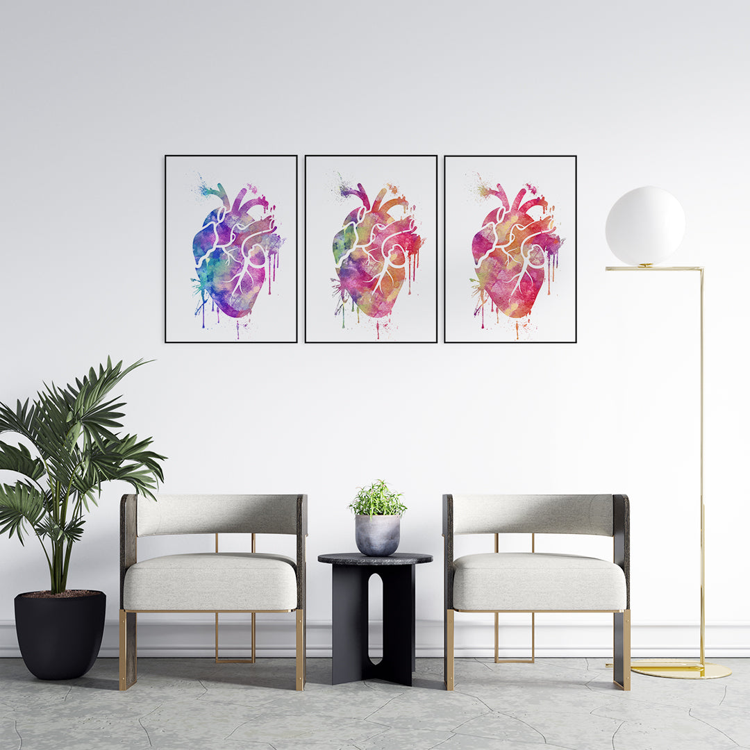 Set of three vibrant watercolor heart prints, on luxurious textured paper, perfect gift for female healthcare workers or medical office decor.