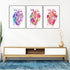 Trio of watercolor heart prints on textured art paper, a thoughtful gift for female medical professionals or clinic decor.