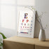 Artistic watercolor print of eye test charts for vision care offices.