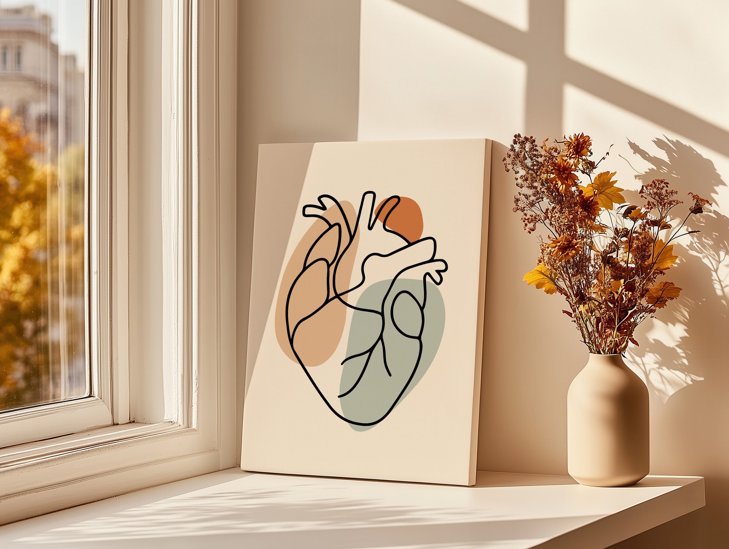 Unframed thick heart canvas leaning beside a window and vase