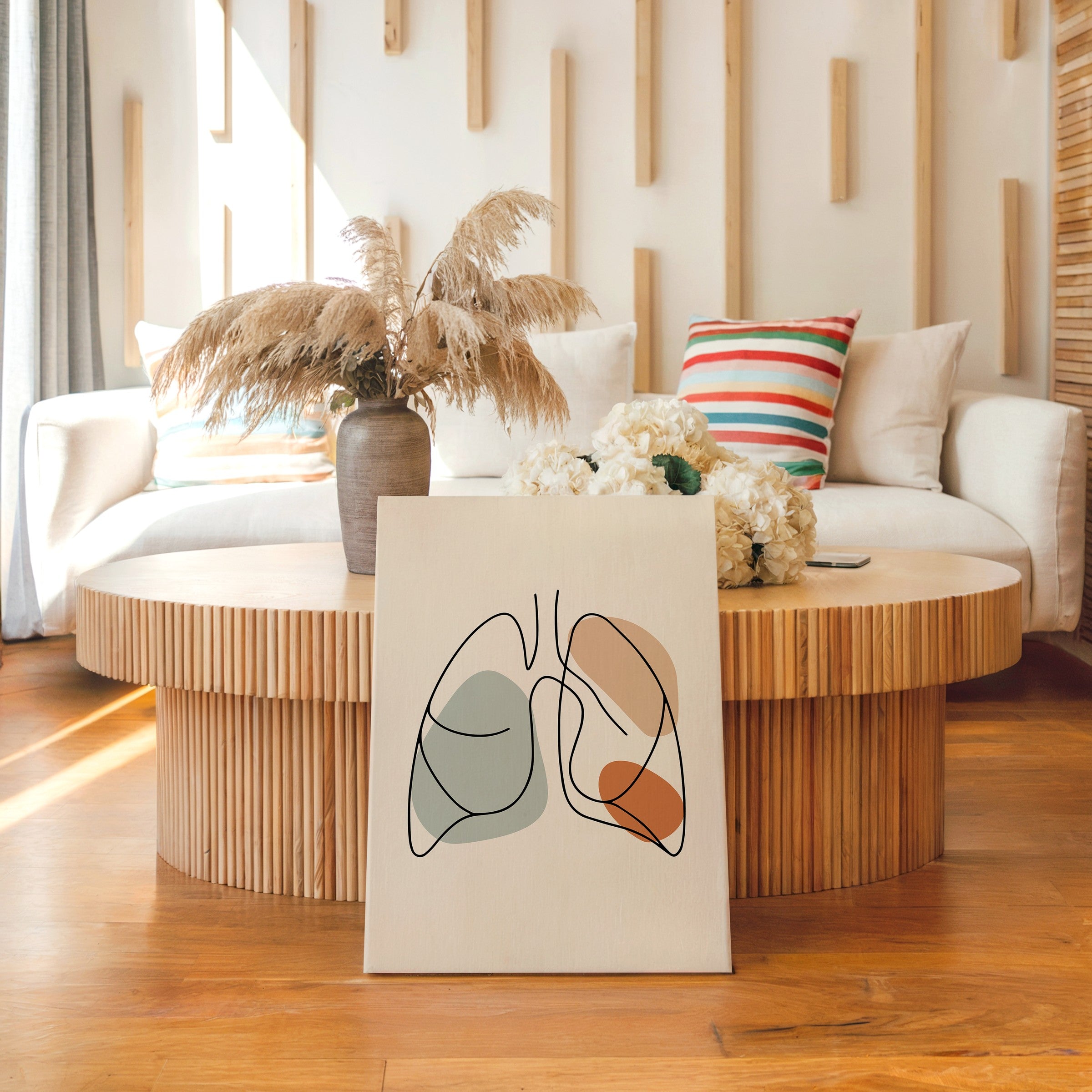 One line lungs artwork styled in a neutral living room