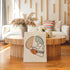 Minimalist skull line art displayed in a neutral living room.